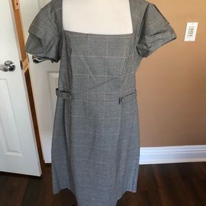 Glenplaid dress. Very attractive.